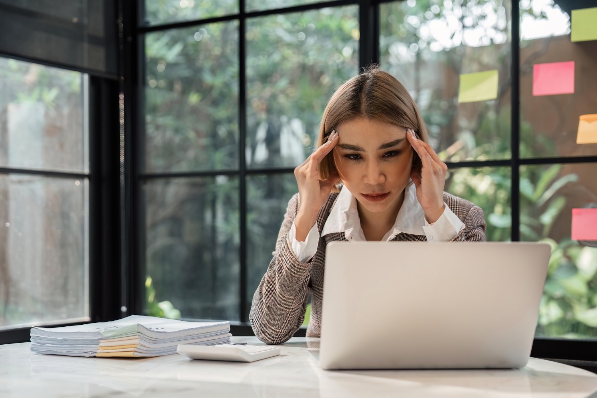 Frustrated woman on computer